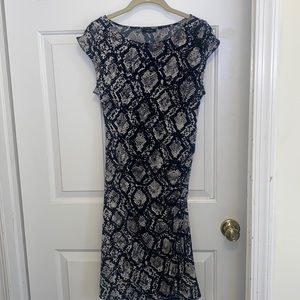 Very comfortable material snakeskin print size medium 96% polyester 5% spandex